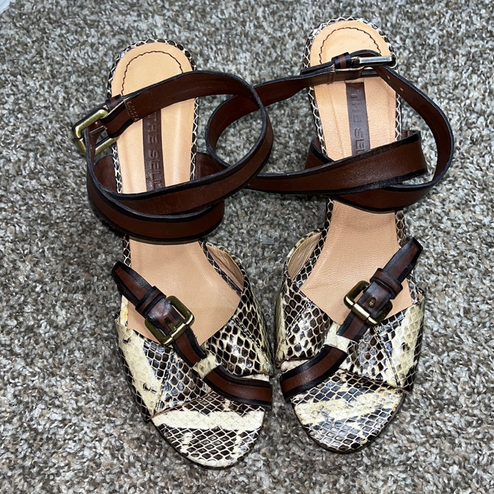 The seller snakeskin heels